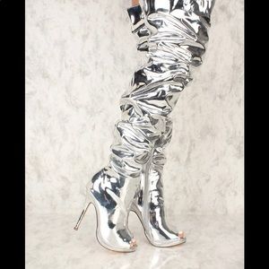 Silver thigh high boots